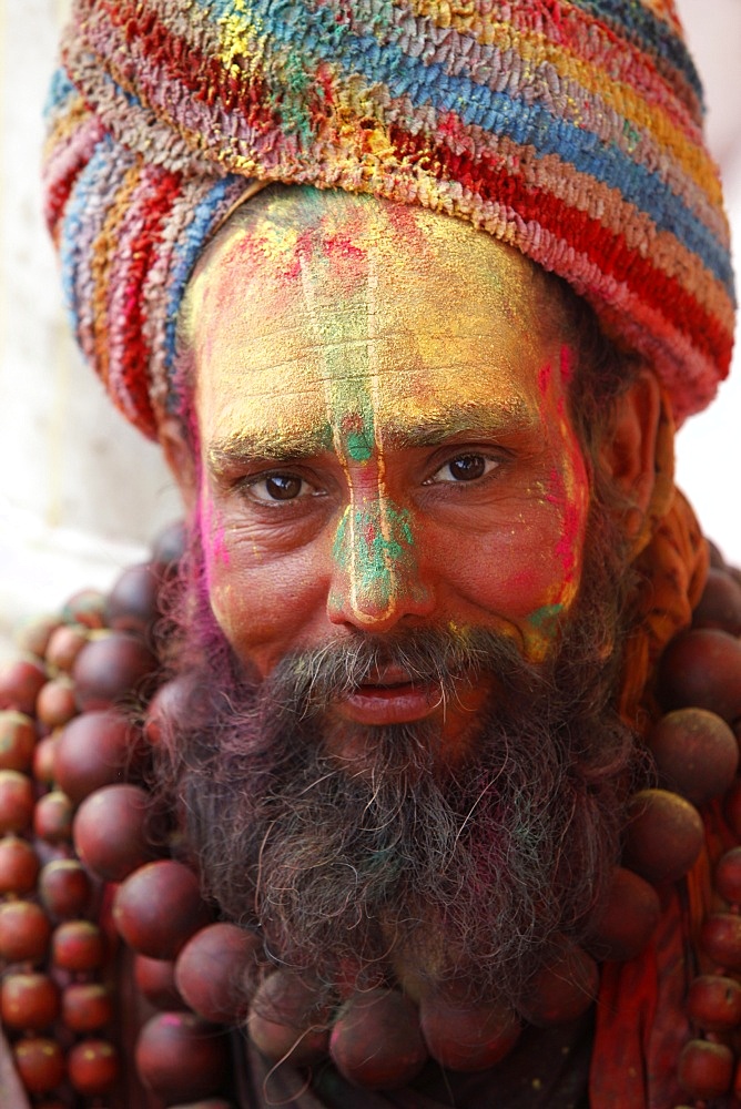 Man celebrating Holi festival, Nandgaon, Uttar Pradesh, India, Asia