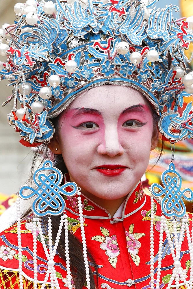 Young woman wearing traditional costumes, Chinese New Year, Paris, France, Europe