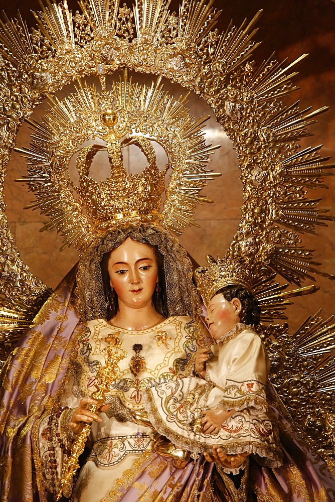 Crowned Virgin and Child statue in Nuestra Senora de la Esperanza church, La Macarena, Seville, Andalucia, Spain, Europe