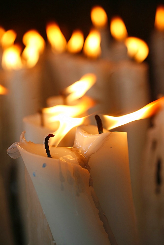 Candles at the Lourdes shrine, Lourdes, Hautes Pyrenees, France, Europe