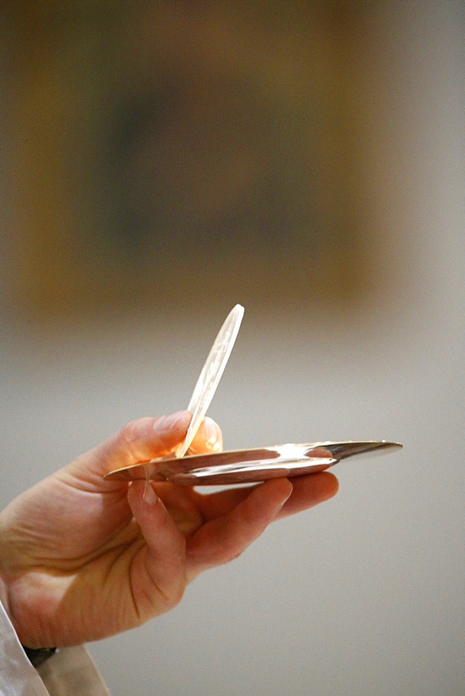 Host and paten, Eucharist, Villemomble, Seine-Saint-Denis, France, Europe