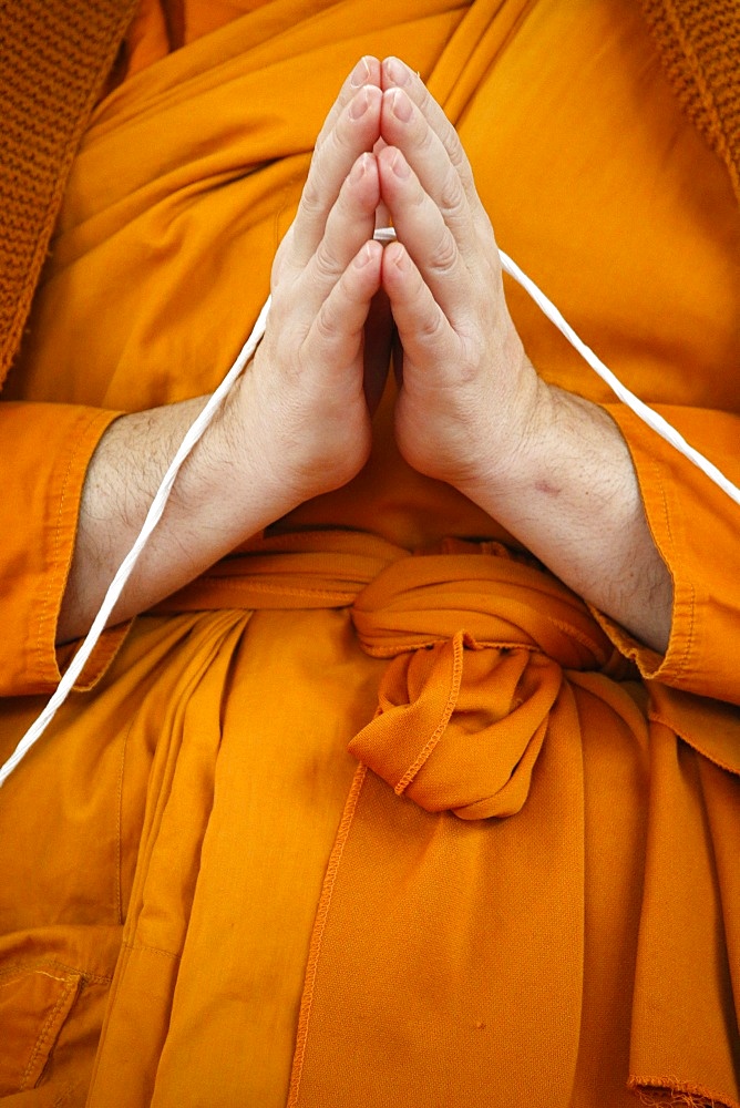 Monk praying, Wat Velouvanaram, Bussy Saint Georges, Seine et Marne, France, Europe