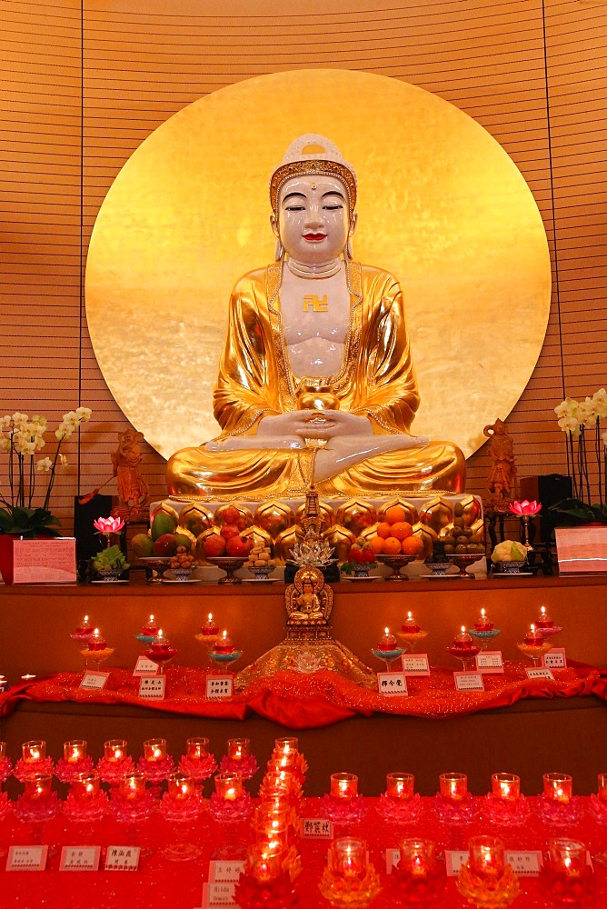 Buddha statue on main altar in Buddha Hall, Fo Guang Shan Temple, Geneva, Switzerland, Europe