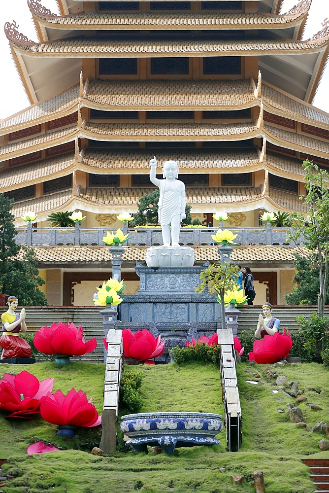 Boy Buddha statue at the top of the stairs with long-ears and one finger pointing to the sky, Minh Dang Quang Buddhist Temple, Ho Chi Minh City, Vietnam, Indochina, Southeast Asia, Asia