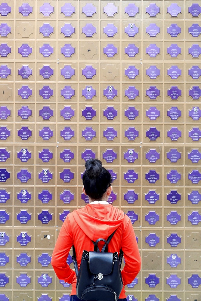 Memorial wall with names of the dead, Church of the Sacred Heart of Jesus (Nha Tho Tan Dinh), Ho Chi Minh City, Vietnam, Indochina, Southeast Asia, Asia