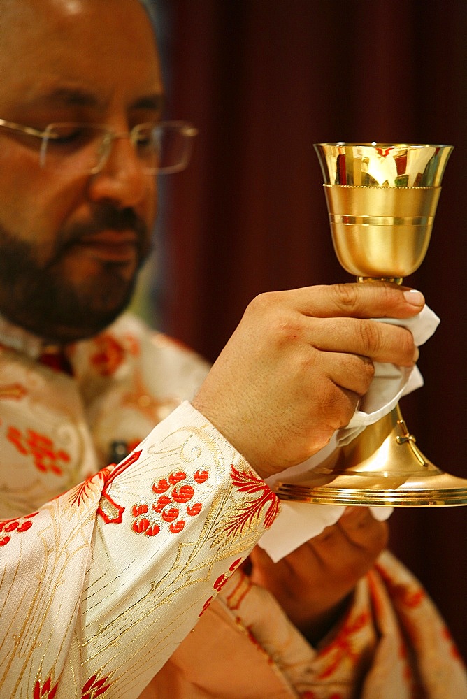 Melkite priest celebrating Mass, Nazareth, Galilee, Israel, Middle East