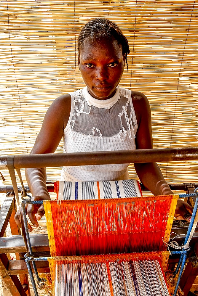 Young weaver in Koudougou, Burkina Faso, West Africa, Africa