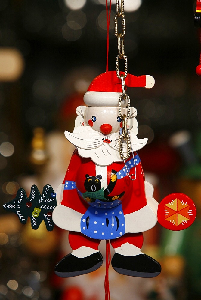 Close-up of Santa Claus decoration in shop at the Christmas market in Munich winter garden, Munich, Bavaria, Germany, Europe