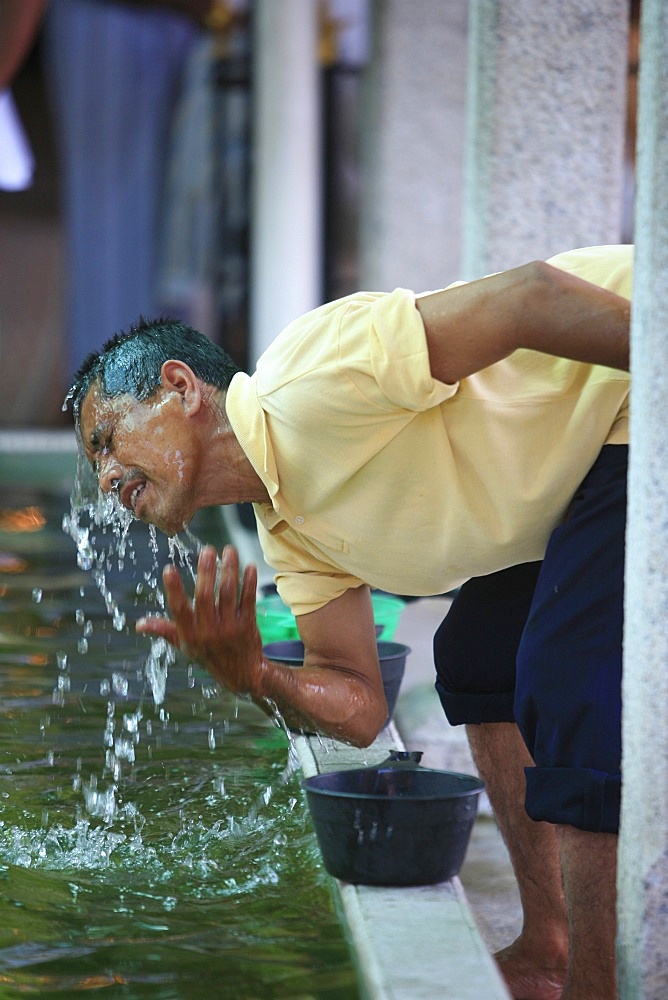 Washing,  Kapitan Kling Mosque, Penang, Malaysia, Southeast Asia, Asia