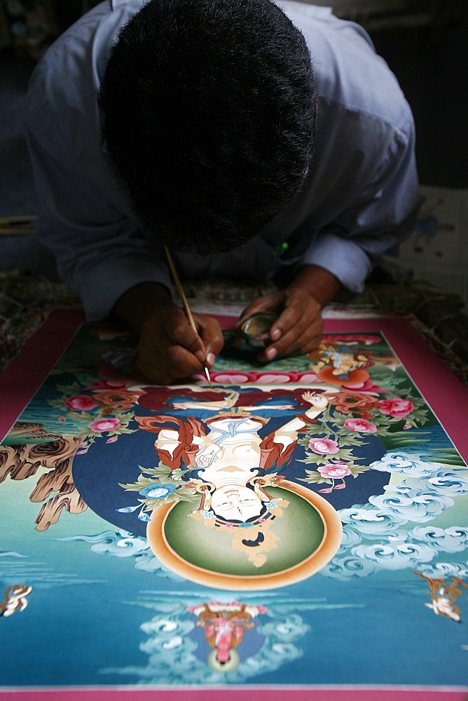 Painting a thangka depicting White Tara goddess, Buddhist symbol of long life, Bhaktapur, Nepal, Asia