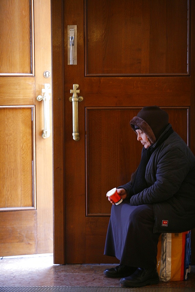 Beggar in Burgersaalkirche, Munich, Bavaria, Germany, Europe