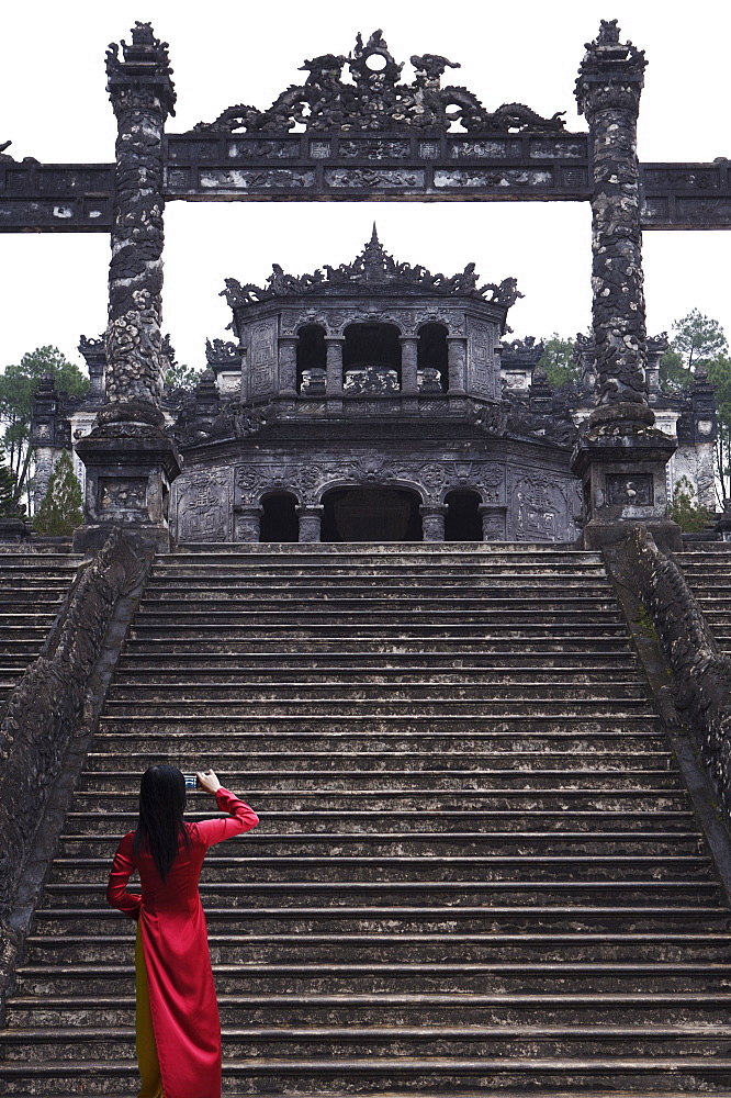 Vietnamese schoolgirl taking picture of Khai Dinh's Tomb, Hue, Vietnam, Indochina, Southeast Asia, Asia