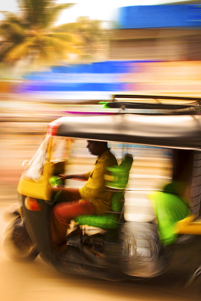 Tuk tuk, at speed, Kerala, India, Asia