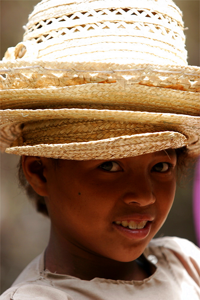 Hat seller, close to Andraikiba Lake, Madagascar, Africa