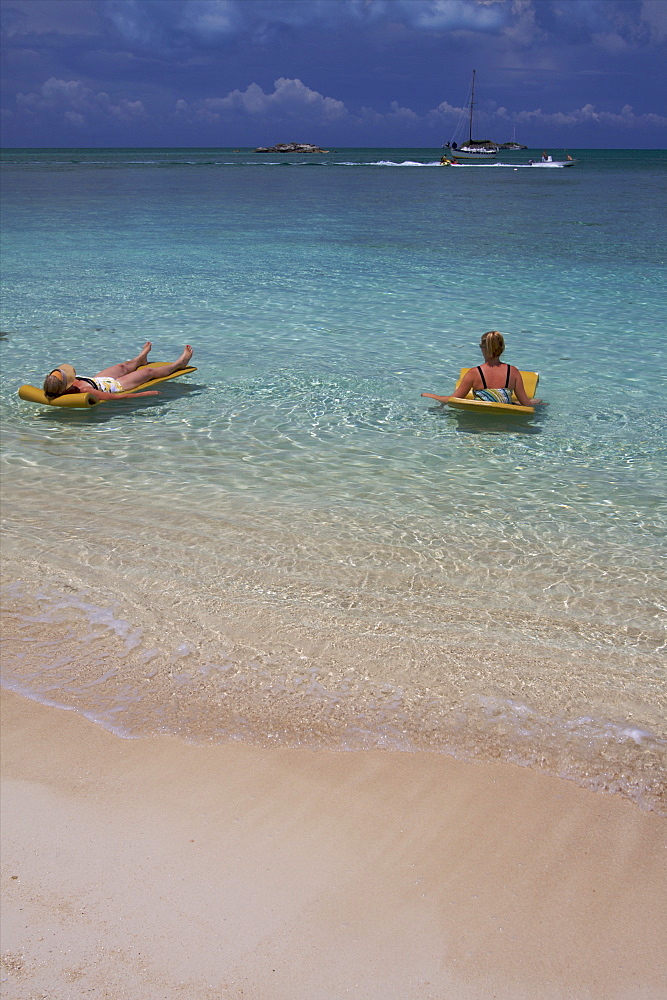 Relaxing on the beach of Fernandez on Cat Island, Bahamas, West Indies, Caribbean, Central America