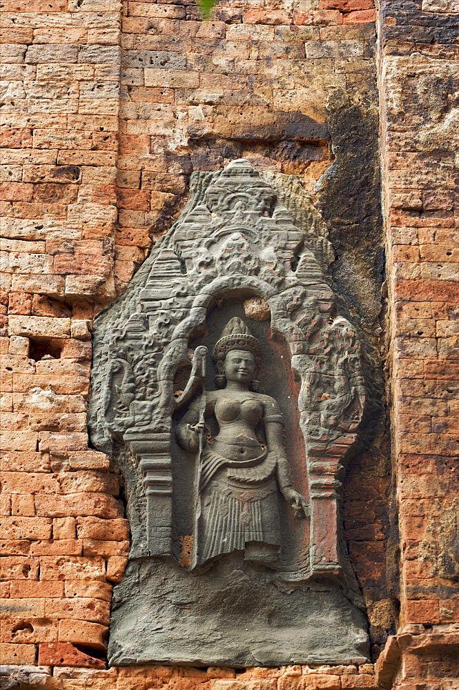 A goddess sculpture on the wall of the pre-Angkor Lolei temple, near Siem Reap, Cambodia, Indochina, Southeast Asia, Asia