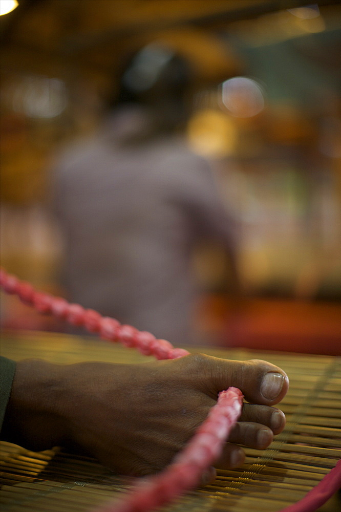 A weaver in the streets of Siem Reap, Cambodia, Indochina, Southeast Asia, Asia