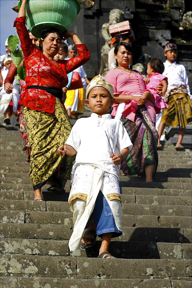 Women and child going down the stairs of the temple of Besakih, Bali, Indonesia, Southeast Asia, Asia