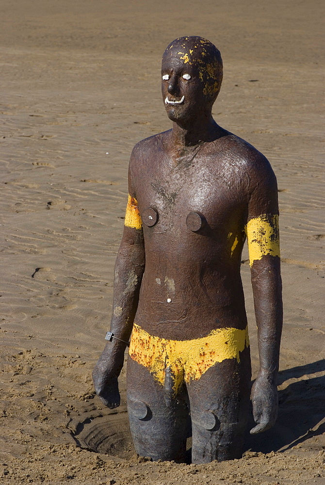 One of the 100 iron men at Crosby Beach, part of Anthony Gormley's Another Place, Liverpool, Merseyside, England, United Kingdom, Europe