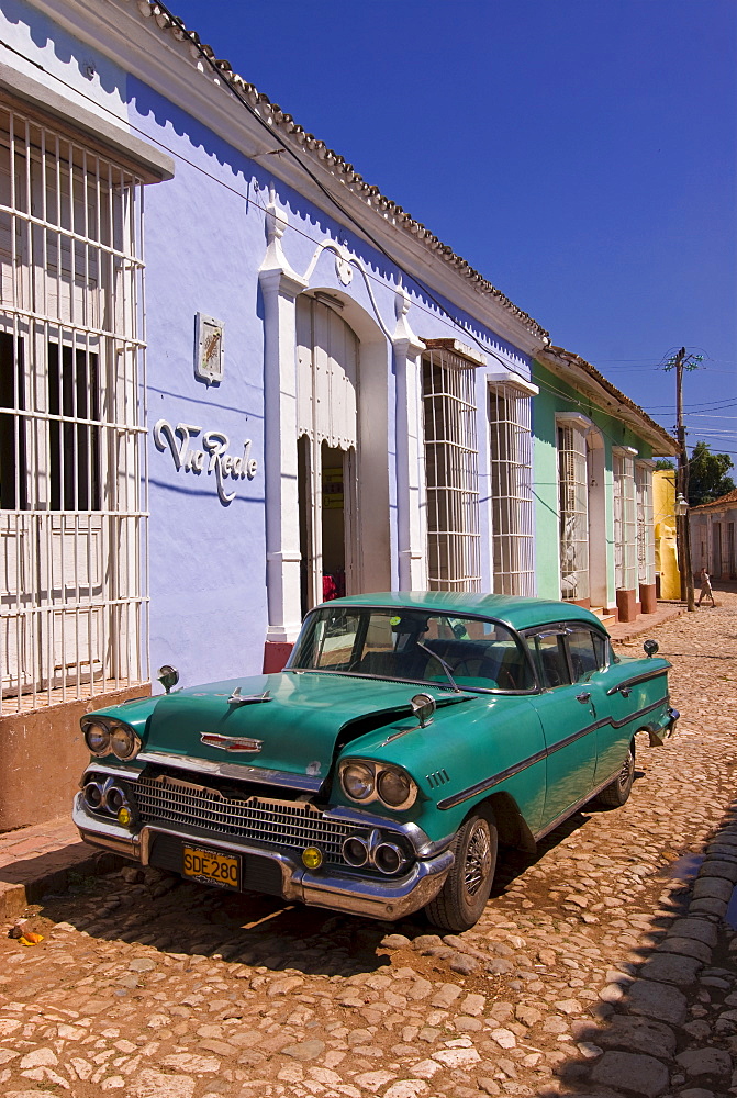 American Oldtimer in the cobbled streets of Trinidad, Cuba, West Indies, Caribbean, Central America