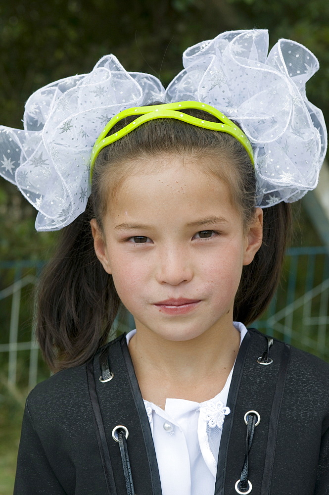 Portrait of girl in traditional clothes, Torugart, Kyrgyzstan, Central Asia, Asia