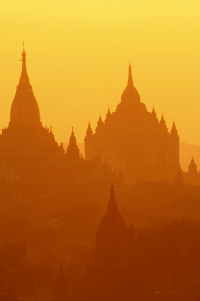 Silhouettes of the temples of the ruined city of Bagan at sunrise, Myanmar, Asia