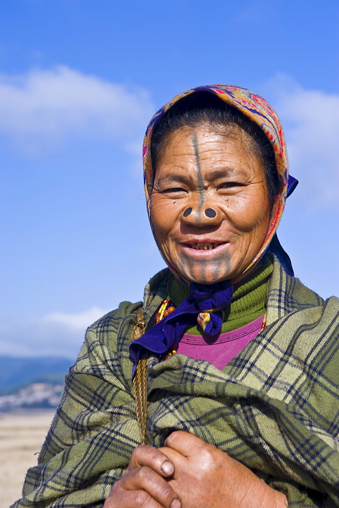 Old woman of the Apatani tribe famous for the wooden pieces in their nose to make them ugly, Ziro, Arunachal Pradesh, Northeast India, India, Asia