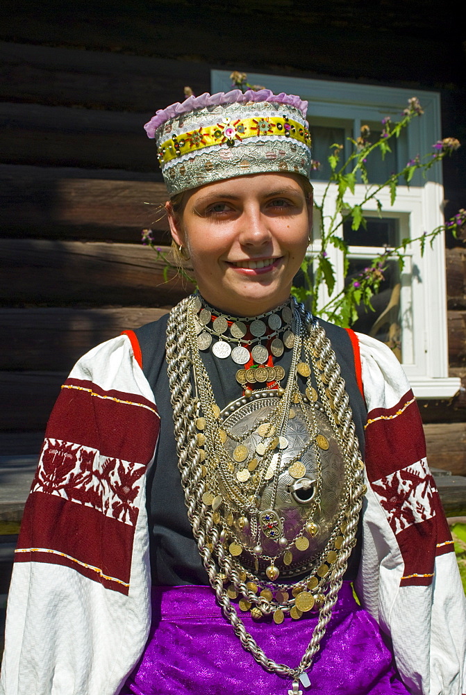 Traditionally dressed Setu woman from a local tribe in South East Estonia, Estonia, Baltic States, Europe