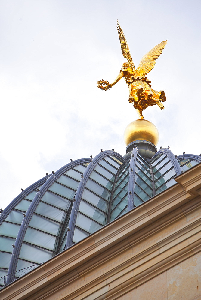 Golden statue on top of the Cathedral, Dresden, Saxony, Germany, Europe