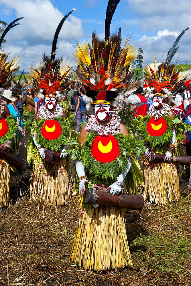 Colourfully dressed and face painted local tribes celebrating the traditional Sing Sing in the Highlands, Papua New Guinea, Pacific