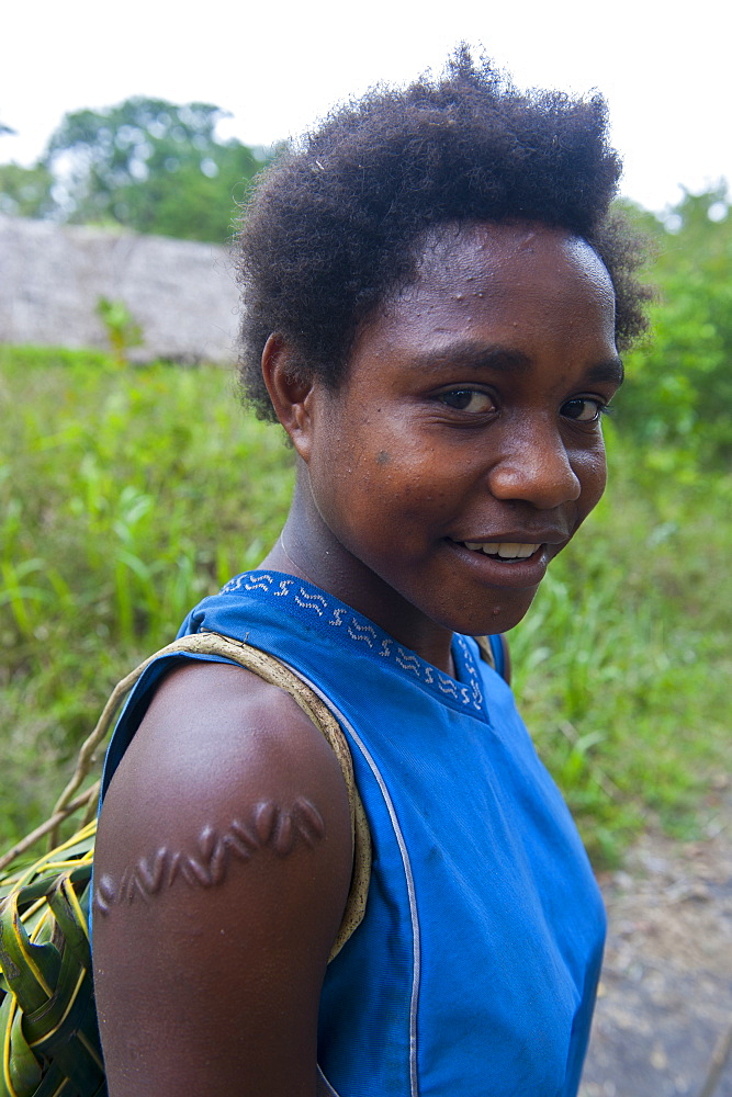 Local girl with typical scar near, Volcano Yasur, Island of Tanna, Vanuatu, South Pacific, Pacific