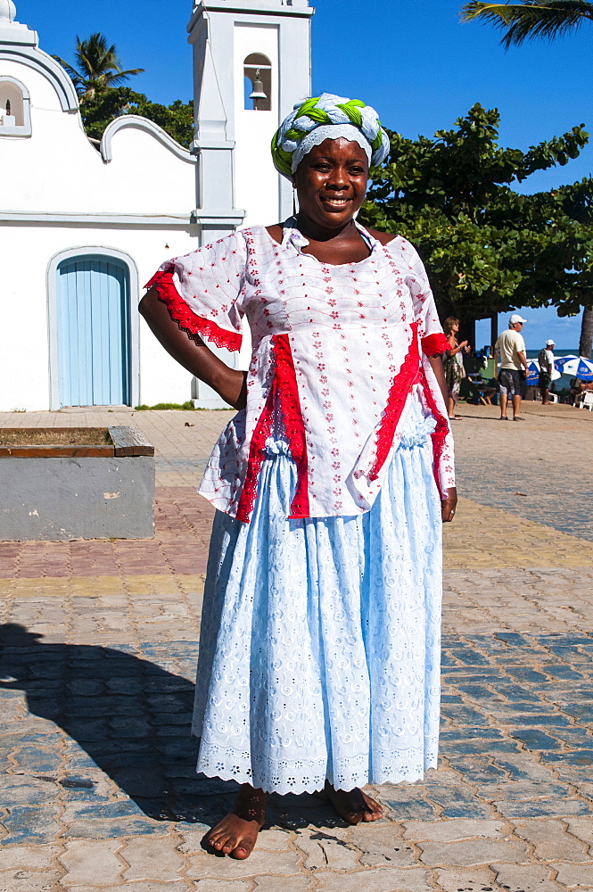 Traditional Bahia dressed woman in Praia do Forte, Bahia, Brazil, South America