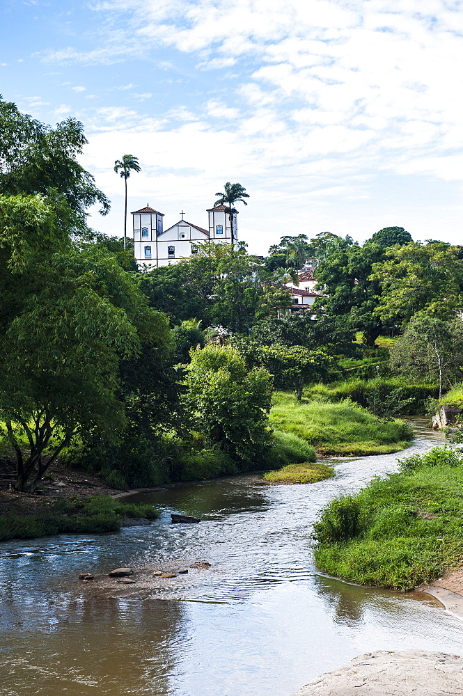 Matrix Church of Our Lady of the Rosary behind a pretty lush landscape in the historic village of Pirenopolis, Goais, Brazil, South America