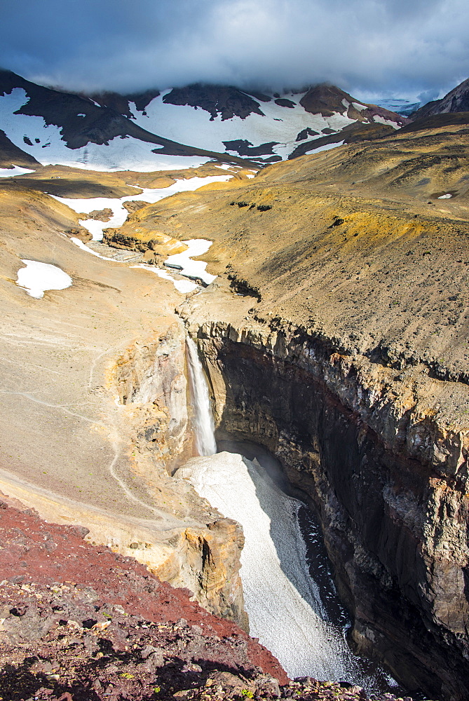 Half frozen waterfall below Mutnovsky volcano, Kamchatka, Russia, Eurasia 