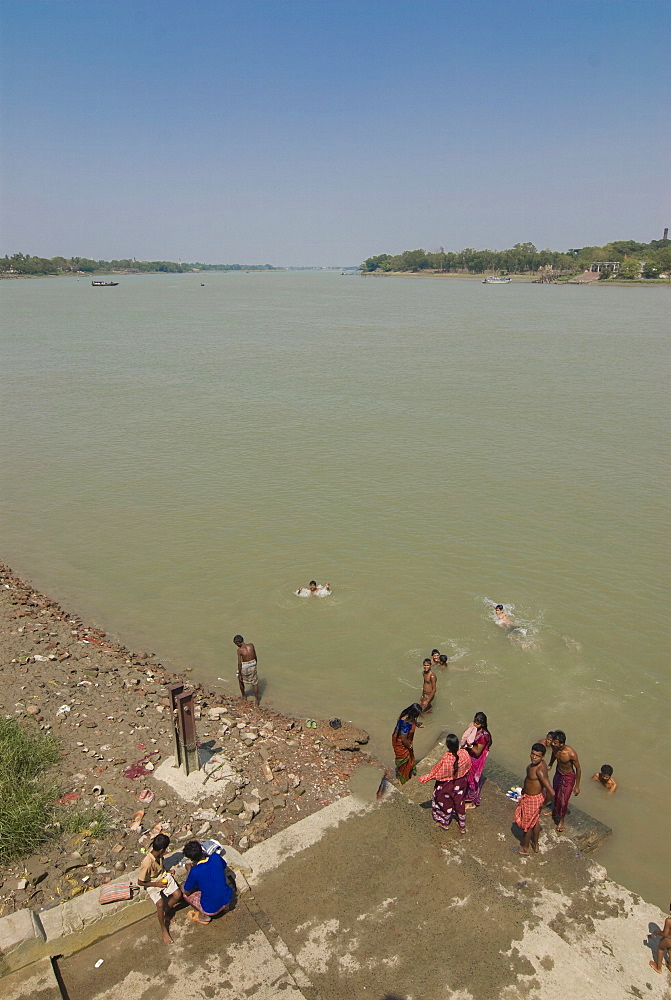 Indian people bathing in the Hooghly river, Kolkata, West Bengal, India, Asia