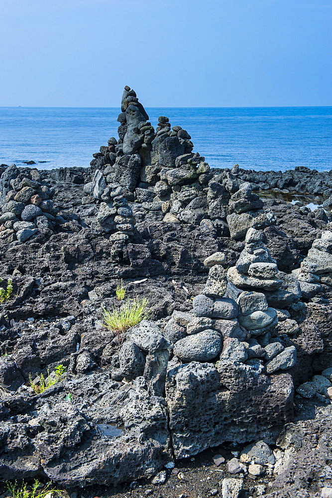 Stone walls made by tourists on the island of Jejudo, UNESCO World Heritage Site, South Korea, Asia