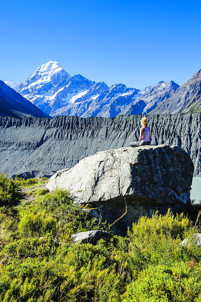 Woman enjoying the view of Mount Cook, UNESCO World Heritage Site, South Island, New Zealand, Pacific