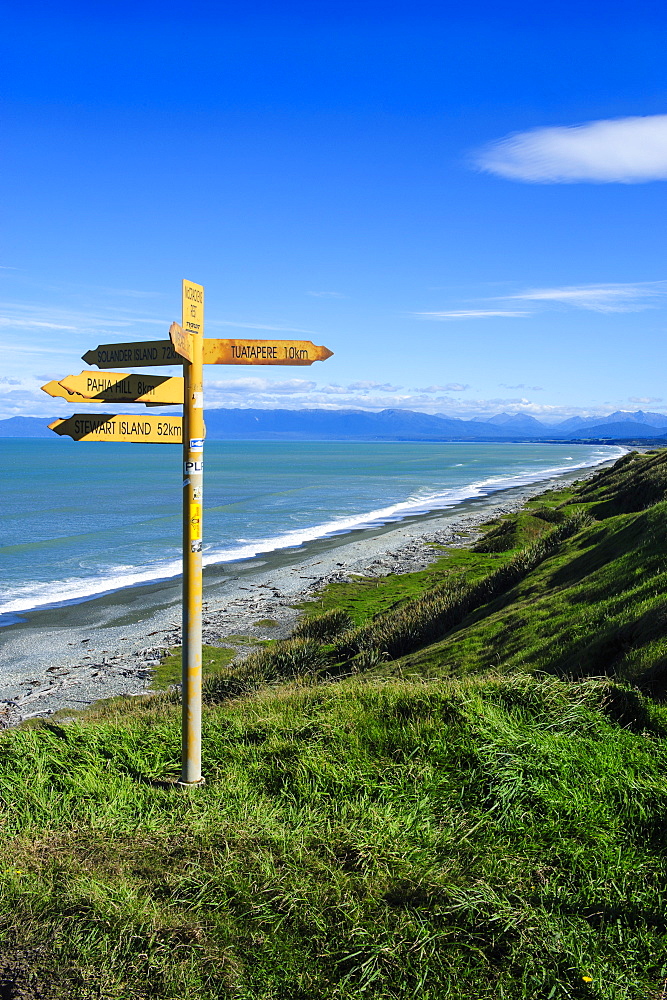 Signpost on Te Waewae Bay, along the road from Invercargill to Te Anau, South Island, New Zealand, Pacific 