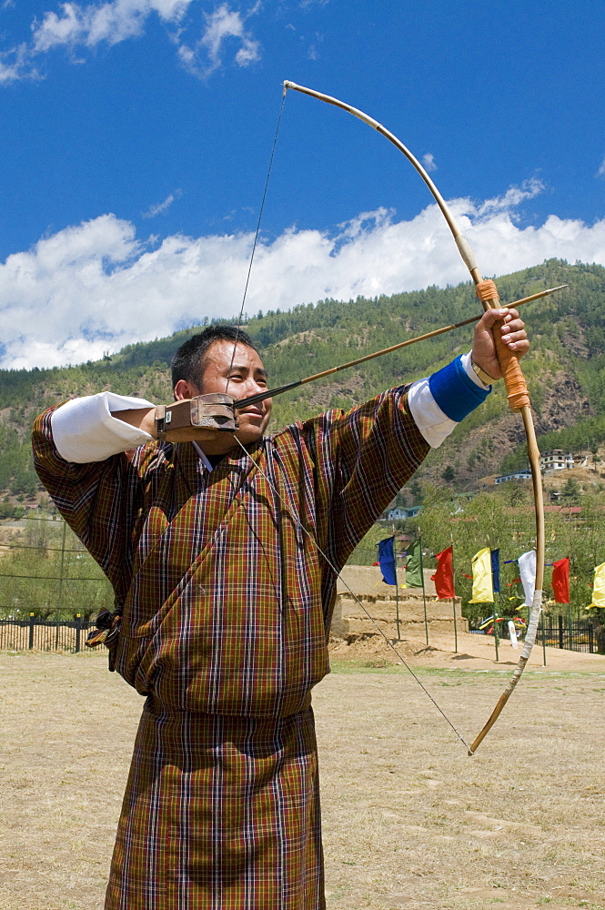 Man practising the national sport of archery, Thimpu, Bhutan, Asia