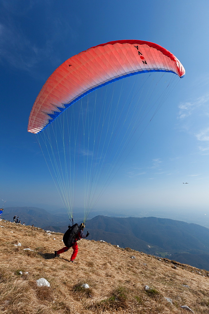 Paragliders flying over Mount Cuarnan, Udine, Friuli, Italy, Europe