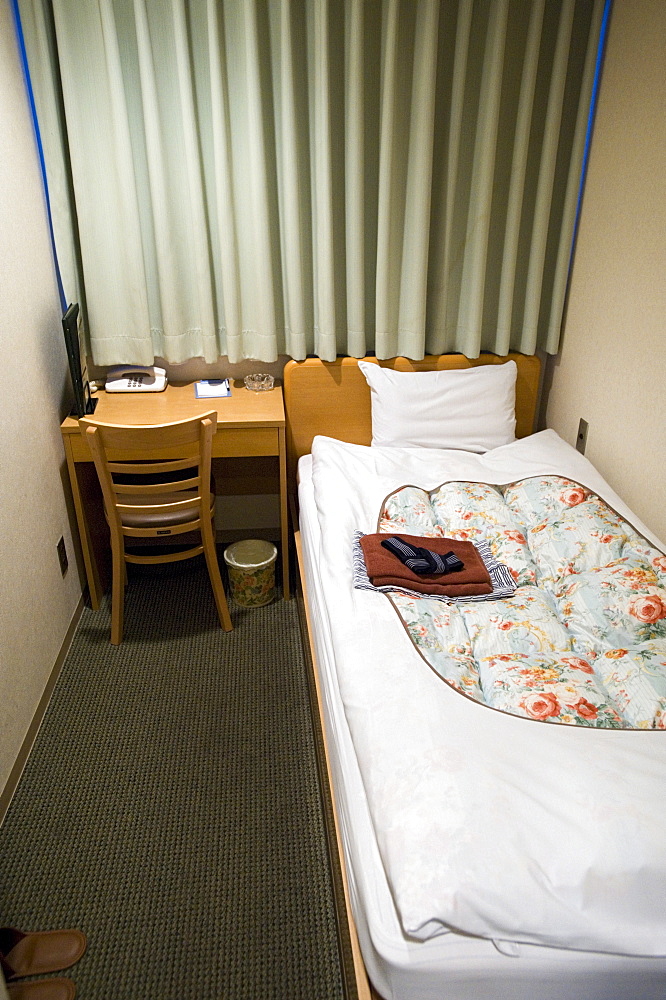 A shoebox-sized hotel room less than two metres wide and costing 8,000 Yen ($80.00)  in central Tokyo, Japan, Asia