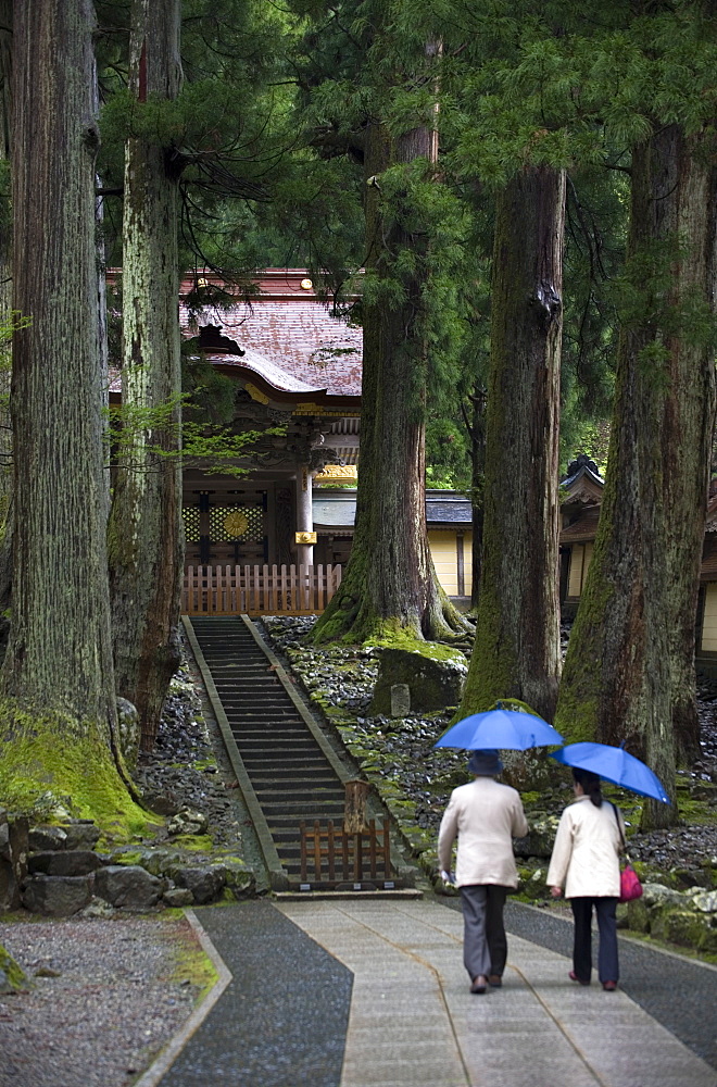 Visitors at Chokushimon Imperial Gate at Eiheiji Temple, headquarters of the Soto sect of Zen Buddhism, in Fukui, Japan