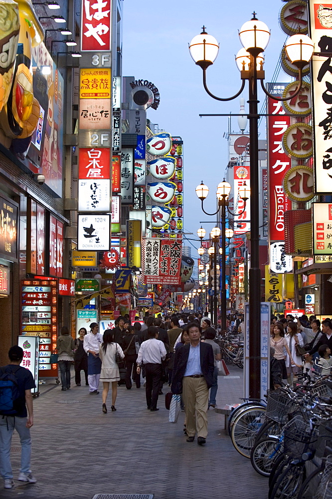 Neon signs bring Dotonbori entertainment district to life after sunset, Osaka, Japan