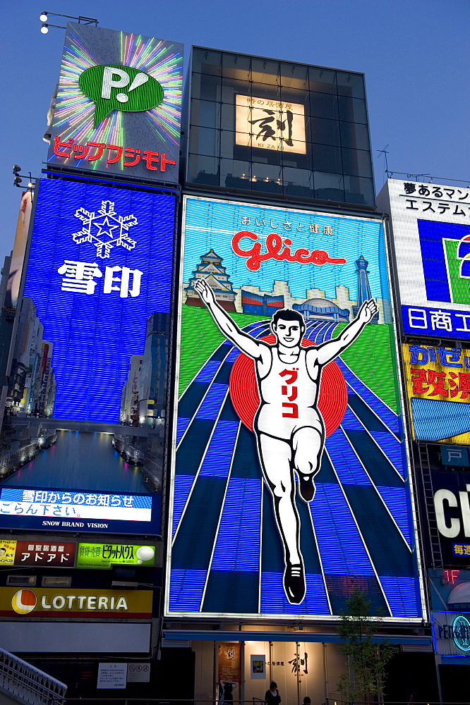 Famous neon wall with Glico runner advert in Dotonbori district of Namba, Osaka, Japan, Asia