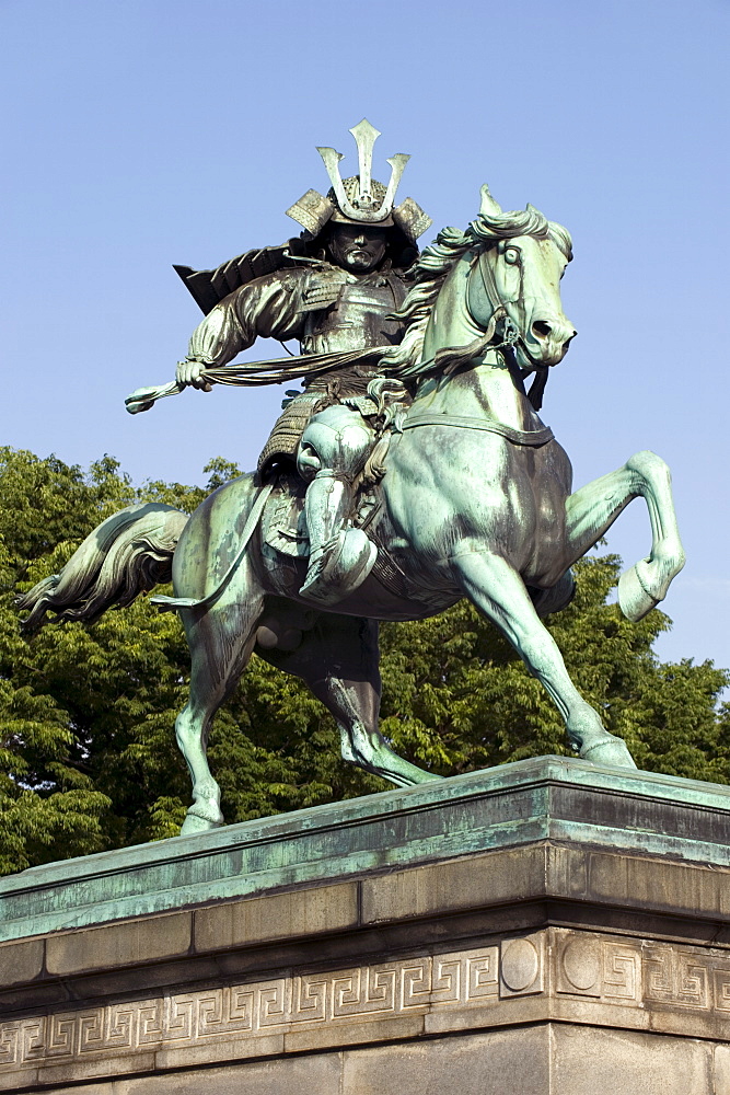 Statue of Samurai warrior Masashige Kusunoki on horseback in Hibiya Park in downtown Tokyo, Japan, Asia