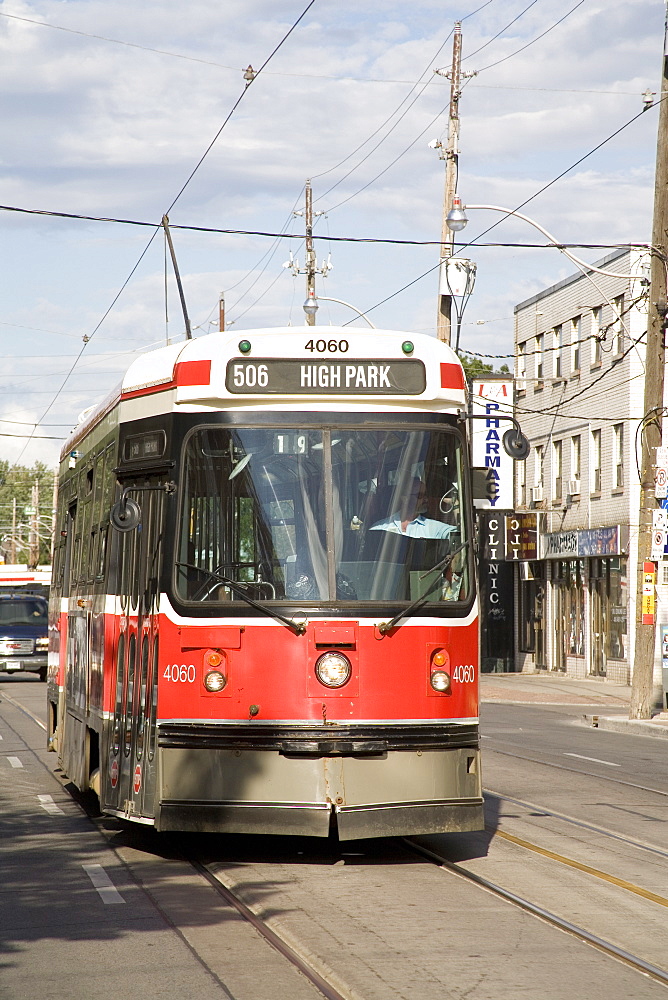 Typical Toronto red rocket, a street car or trolley bus, Toronto, Ontario, Canada, North America