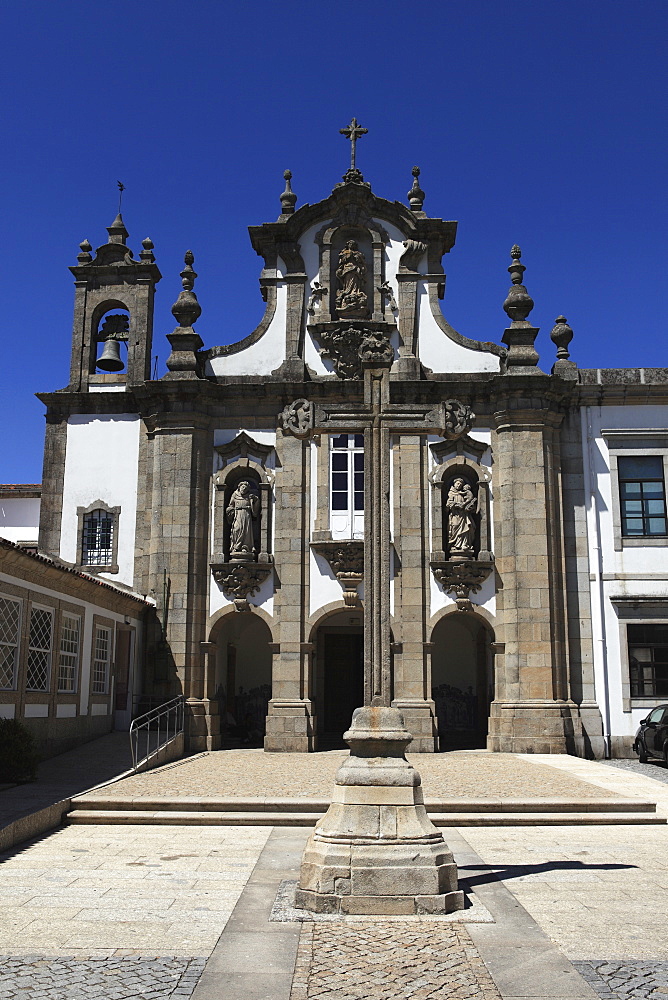 The Carmelite Convent (Convento do Carmo) and crucifix in the old town of Guimaraes, UNESCO World Heritage Site, Minho, Portugal, Europe