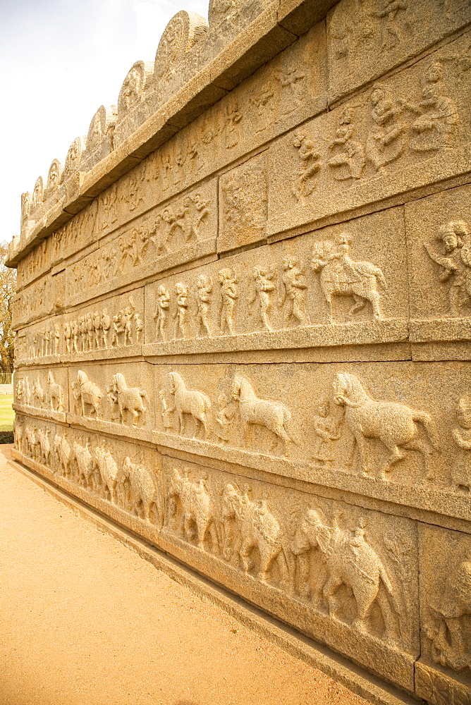 Bas relief scenes from life in the Vijayanagar Empire on the Mahanavami Dibba within the royal enclosure at Hampi, UNESCO World Heritage Site, Karnataka, India, Asia