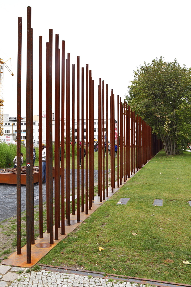 Metal poles mark the outline of the demolished Berlin Wall (1961 to 1989) at Bernauerstrasse, Berlin, Germany, Europe