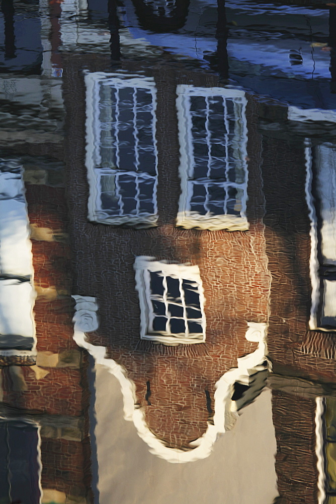 Traditional Dutch housing reflected in the Oudegracht Canal in the city of Utrecht, Utrecht Province, Netherlands, Europe